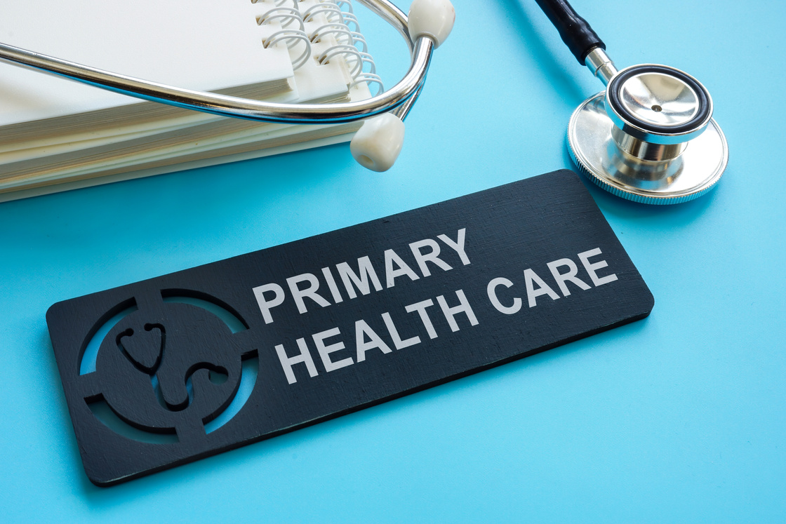 Primary health care sign with papers and stethoscope.